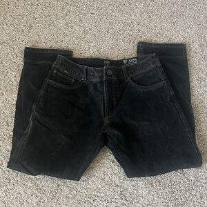 Men's Dark Kuhl utility pants.